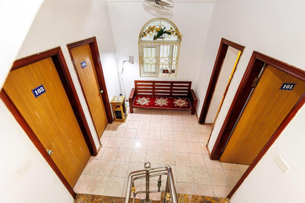 Postel nebo postele na pokoji v ubytování Binh Minh Ngoc Khanh Hotel