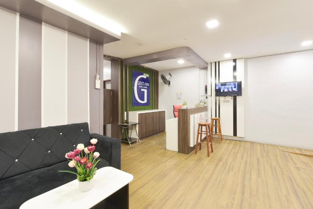 TV a/nebo společenská místnost v ubytování OYO 90963 Gest Inn
