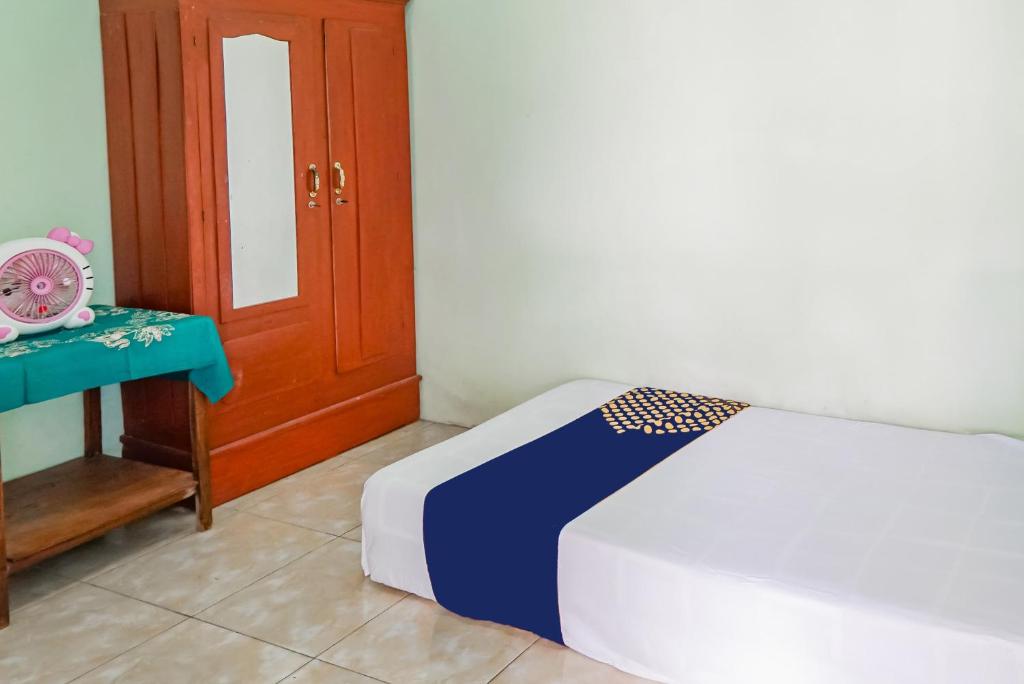 Hotel O Wunut Homestay Syariah - Housity