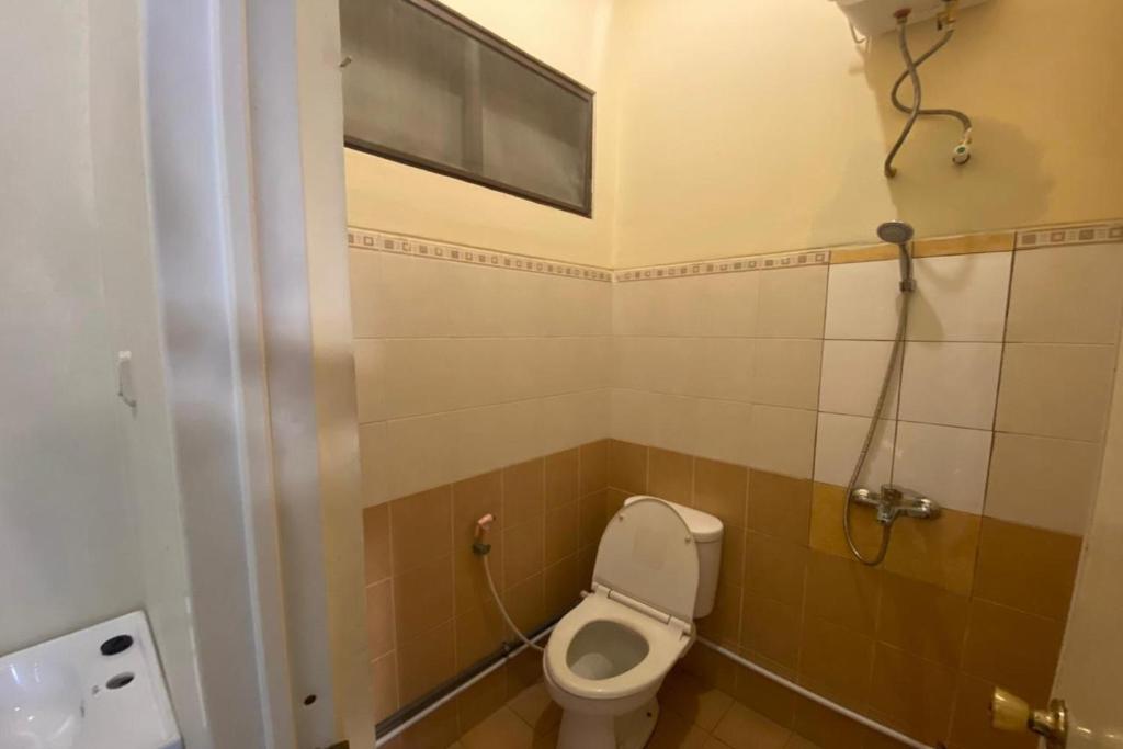 Koupelna v ubytování Sweet Home Residence Simpang Lima