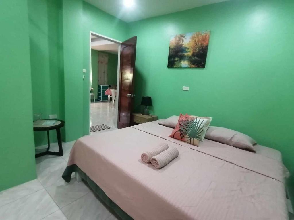 Postel nebo postele na pokoji v ubytování Andresas Homestay