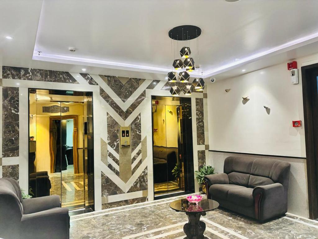 Posezení v ubytování Delta Suites - The Soothing Luxury