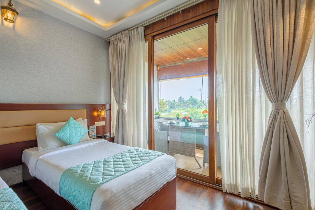 Postel nebo postele na pokoji v ubytování Salcete Beach Resort