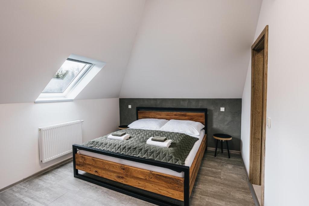 Postel nebo postele na pokoji v ubytování Apartmány Petra Voka