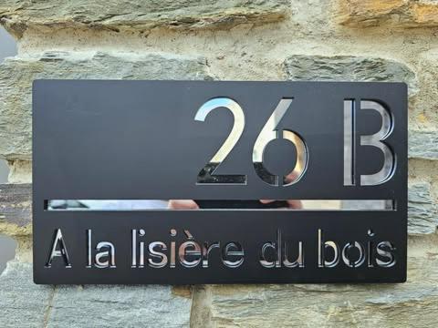 Certifikát, hodnocení, plakát nebo jiný dokument vystavený v ubytování À la lisière du bois