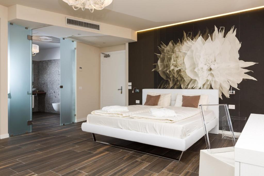 Postel nebo postele na pokoji v ubytování Pace 1954 Hotel