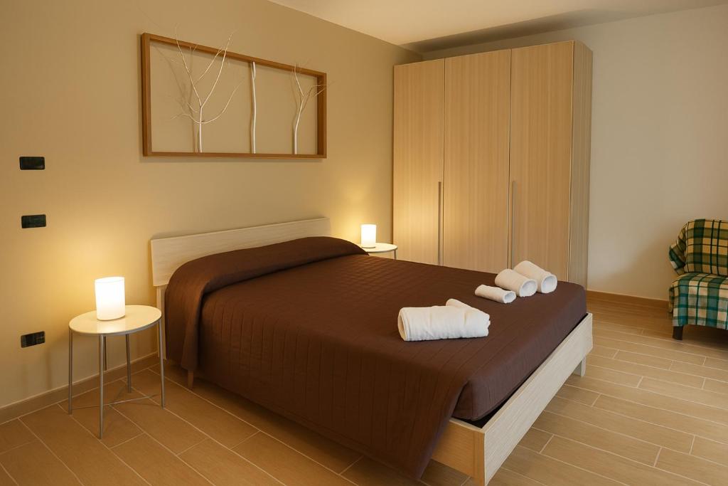 Postel nebo postele na pokoji v ubytování B&B Bosco Ralle - comfort e natura