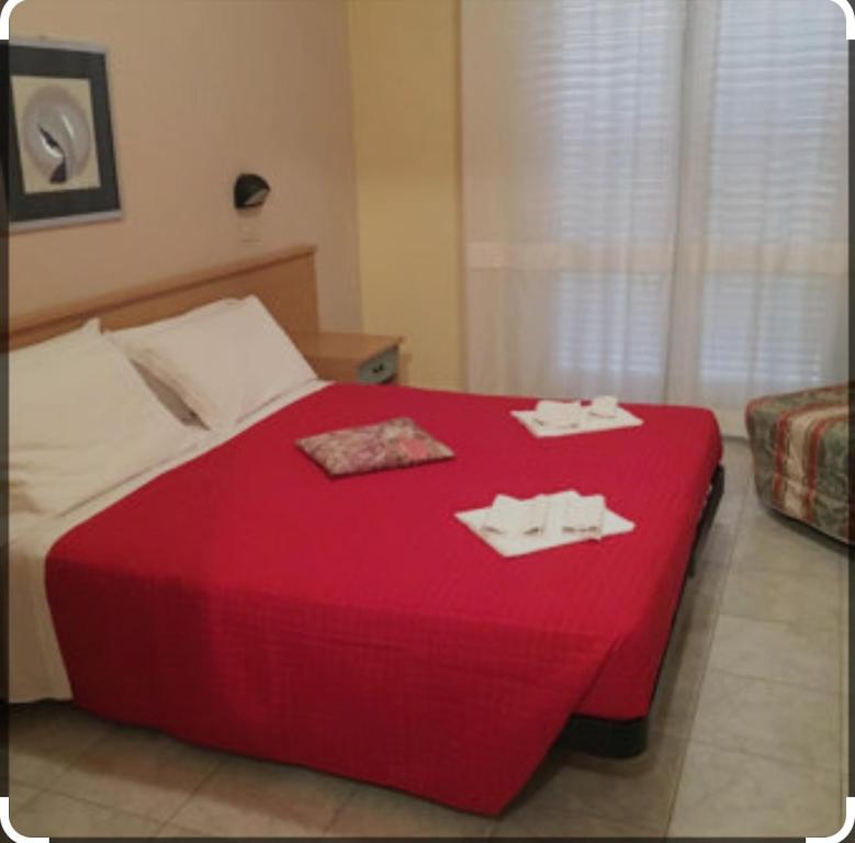 Postel nebo postele na pokoji v ubytování Hotel Anny