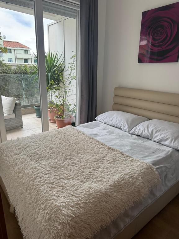 Postel nebo postele na pokoji v ubytování Pretty apartment near the sea!