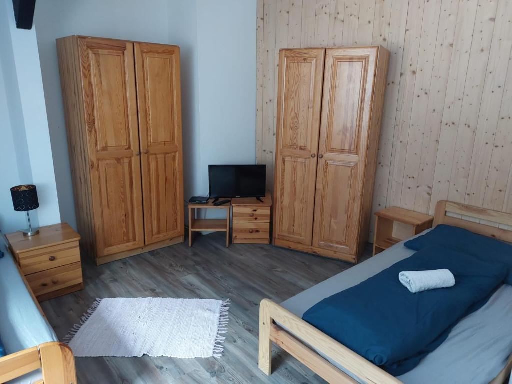 Postel nebo postele na pokoji v ubytování Penzión Kupfer