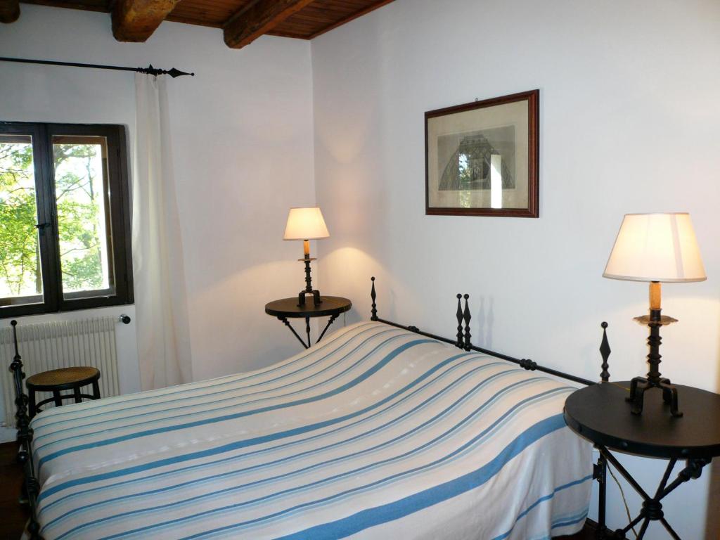 Postel nebo postele na pokoji v ubytování Agriturismo Beria de Carvalho de Puppi