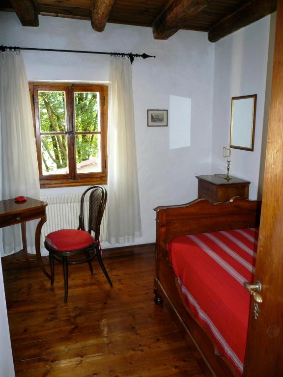 Postel nebo postele na pokoji v ubytování Agriturismo Beria de Carvalho de Puppi