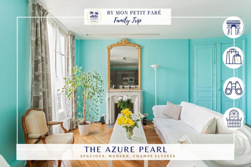 - un salon avec des murs bleus et un canapé blanc dans l'établissement The Azure Pearl -Spacious & Modern, à Paris