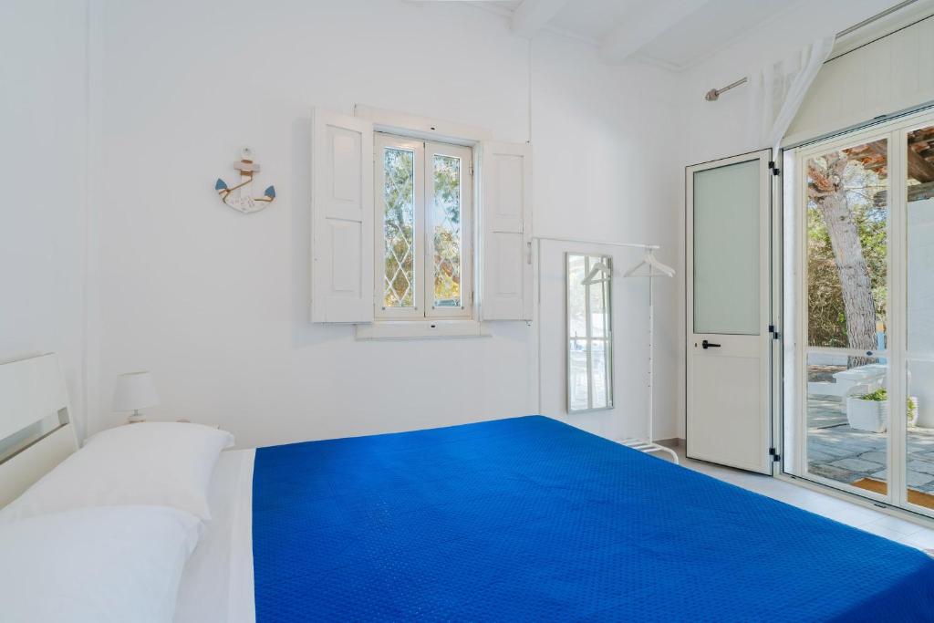 Postel nebo postele na pokoji v ubytování Il Respiro del Mare - Salento Selection