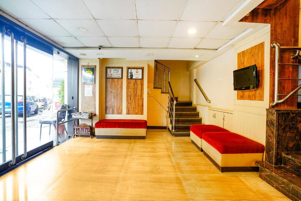 TV a/nebo společenská místnost v ubytování Fabhotel Manoshanti - Nr Big Daddy Casino