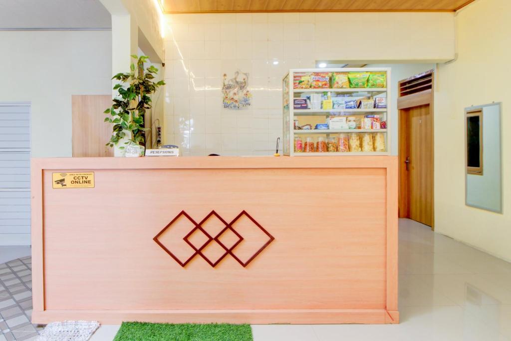 Fotografie z fotogalerie ubytování Hotel O Alun-Alun Purwokerto Near Gor Satria Purwokerto Formerly Guest House Blessing v destinaci Purwokerto