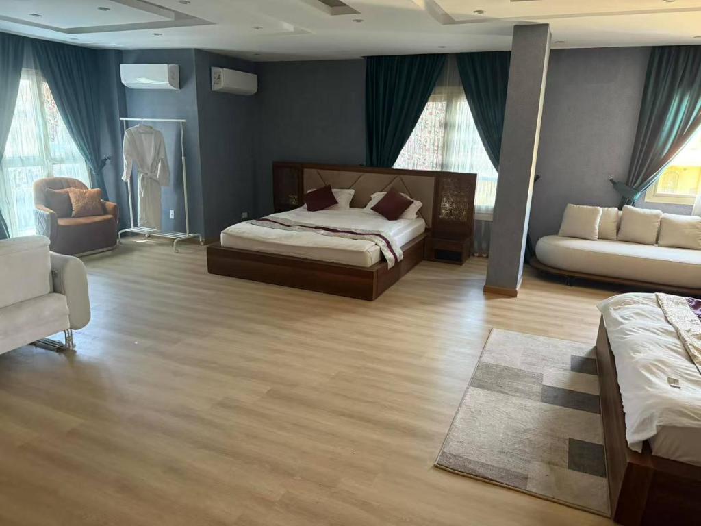 Postel nebo postele na pokoji v ubytování JubingeHotel 聚滨阁民宿