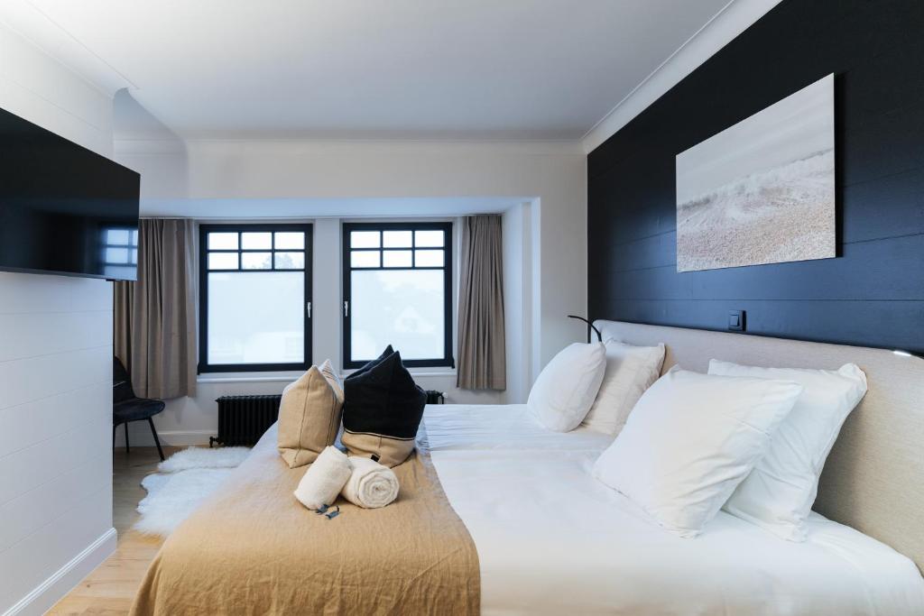 Postel nebo postele na pokoji v ubytování Boutique Hotel Azur