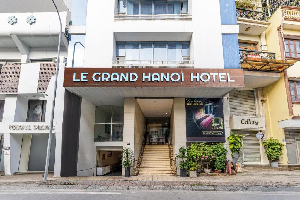 a building with a sign that reads le grand hanoi hotel at Collection O Le Grand Hanoi hotel - The Sun in Hanoi