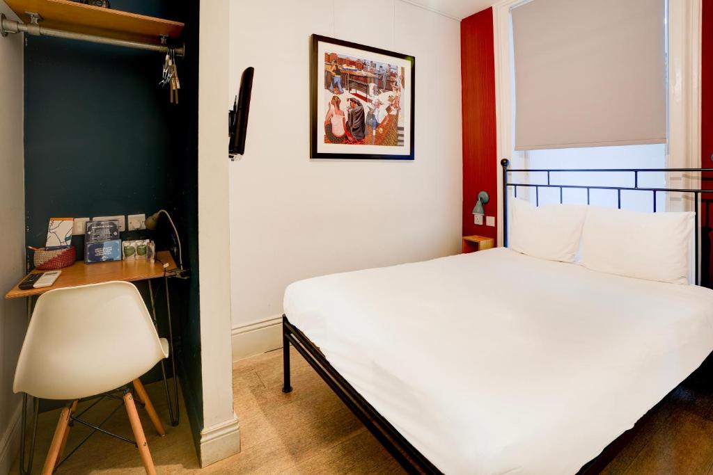 Postel nebo postele na pokoji v ubytování Peckham Rooms Hotel by Belvilla London