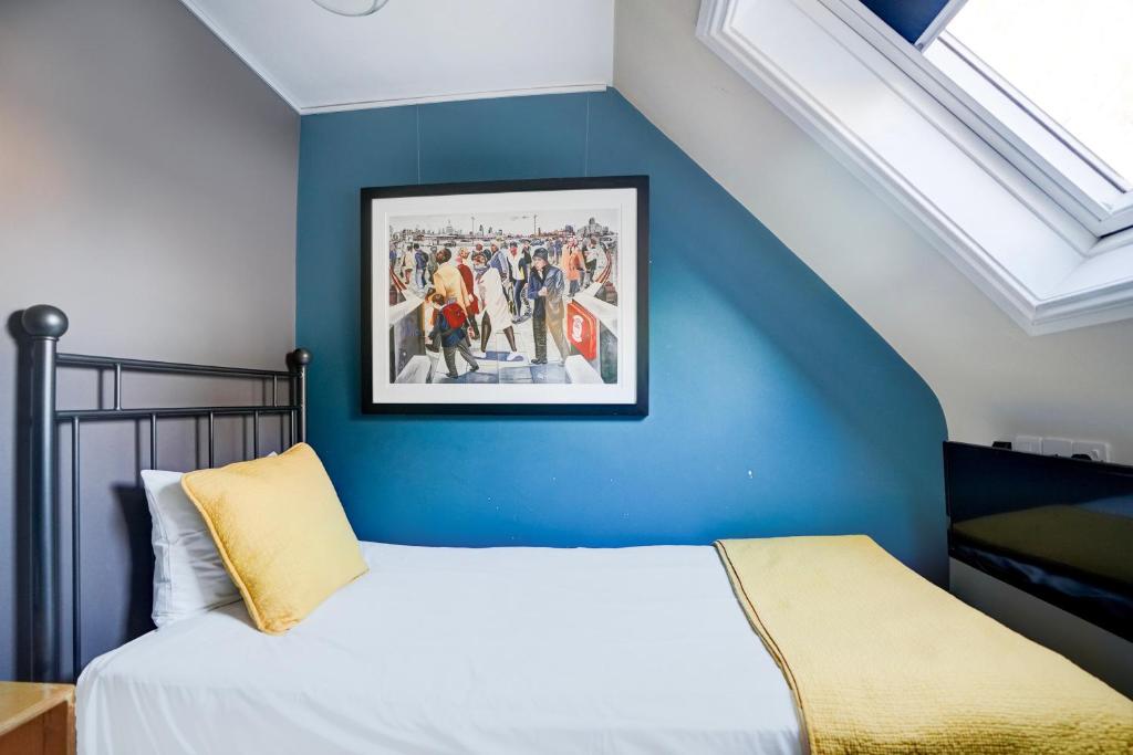 Postel nebo postele na pokoji v ubytování Peckham Rooms Hotel by Belvilla London