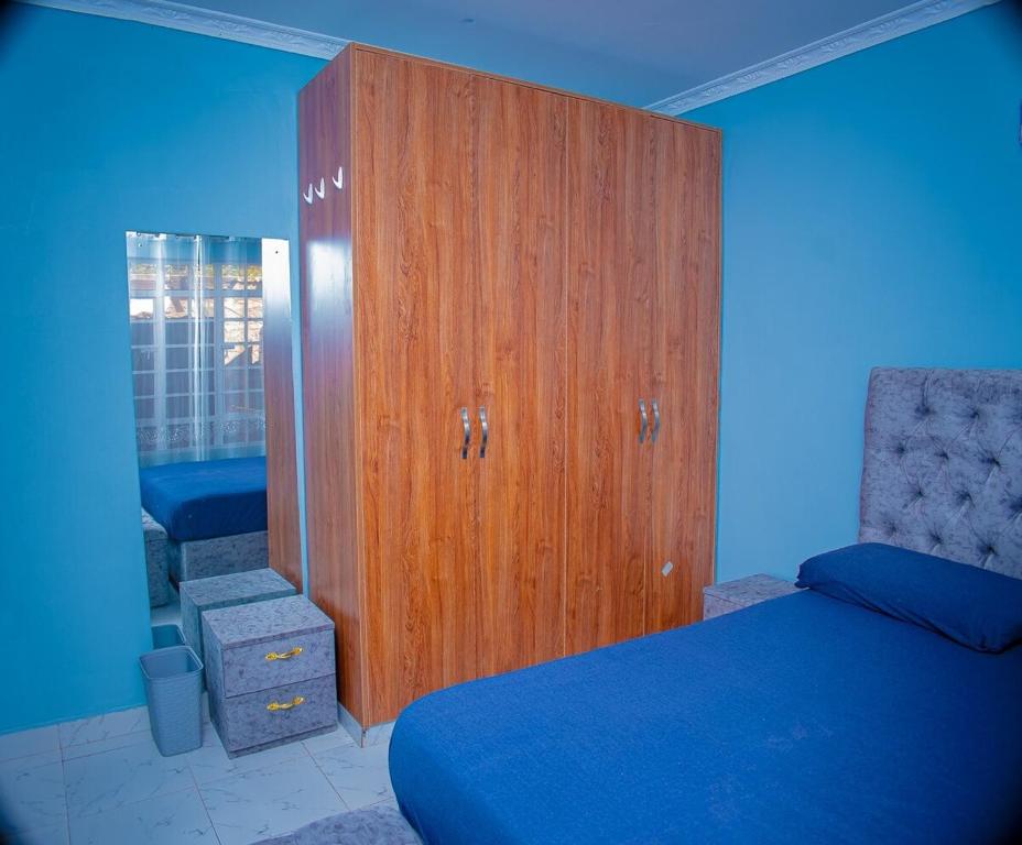 Postel nebo postele na pokoji v ubytování Wendell's Place