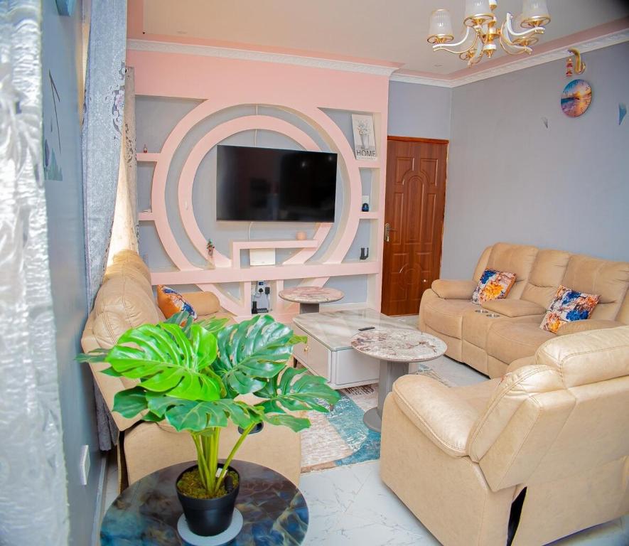 TV a/nebo společenská místnost v ubytování Wendell's Place