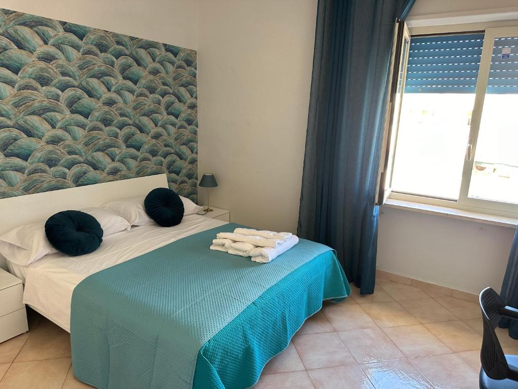 Postel nebo postele na pokoji v ubytování Holiday and Relax rooms