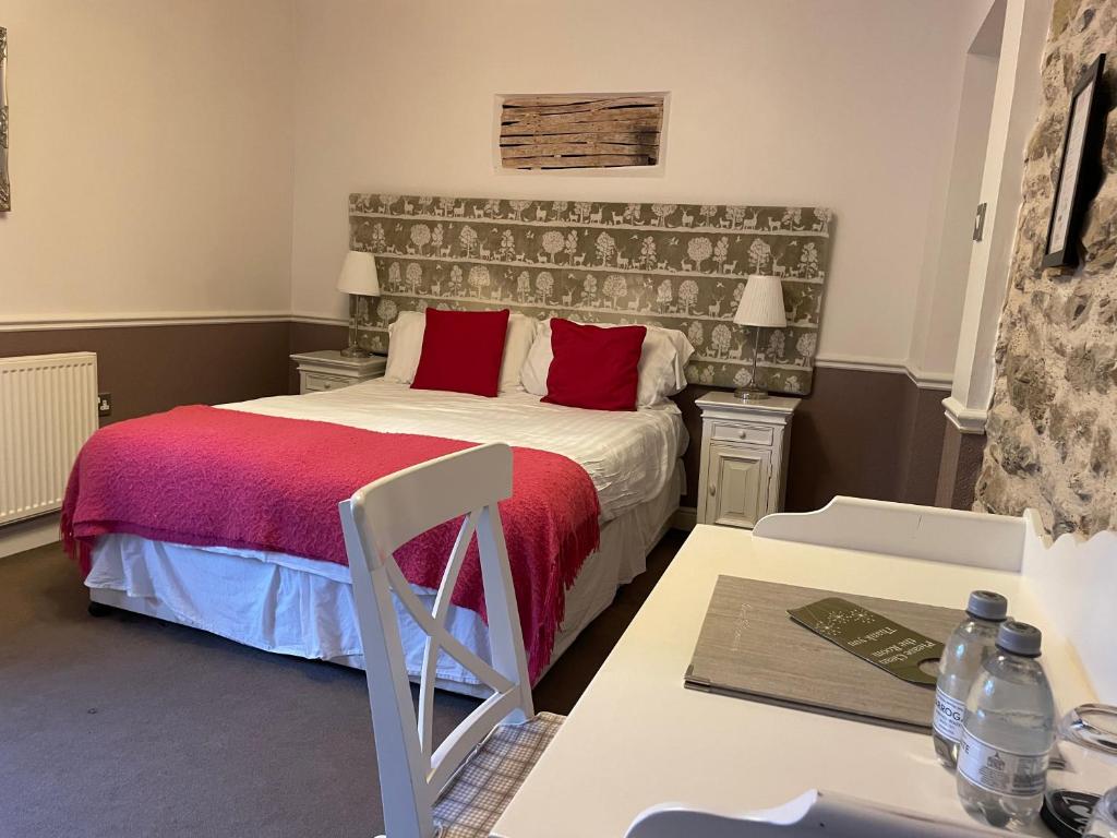 Postel nebo postele na pokoji v ubytování OYO New Inn Hotel