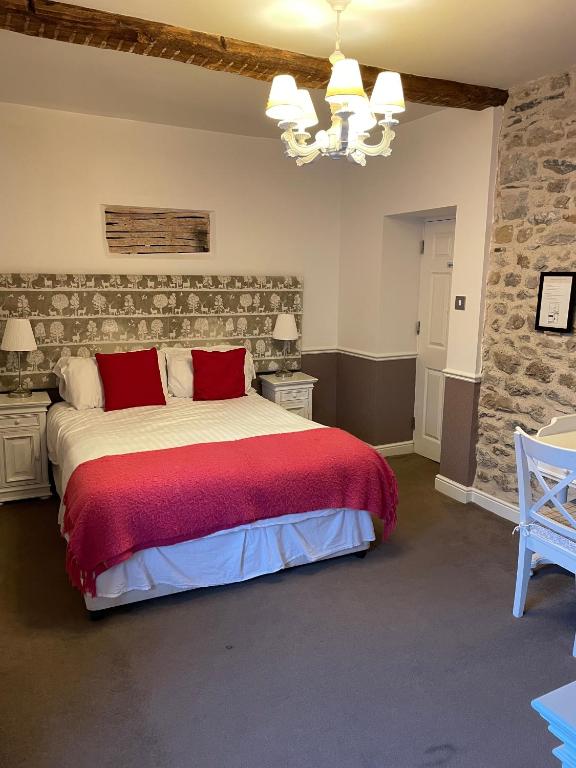 Postel nebo postele na pokoji v ubytování OYO New Inn Hotel