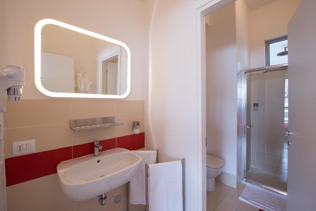 Koupelna v ubytování Levante Residence