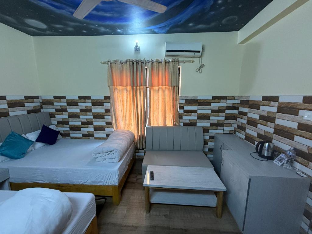 Postel nebo postele na pokoji v ubytování Hotel Center Inn Lake