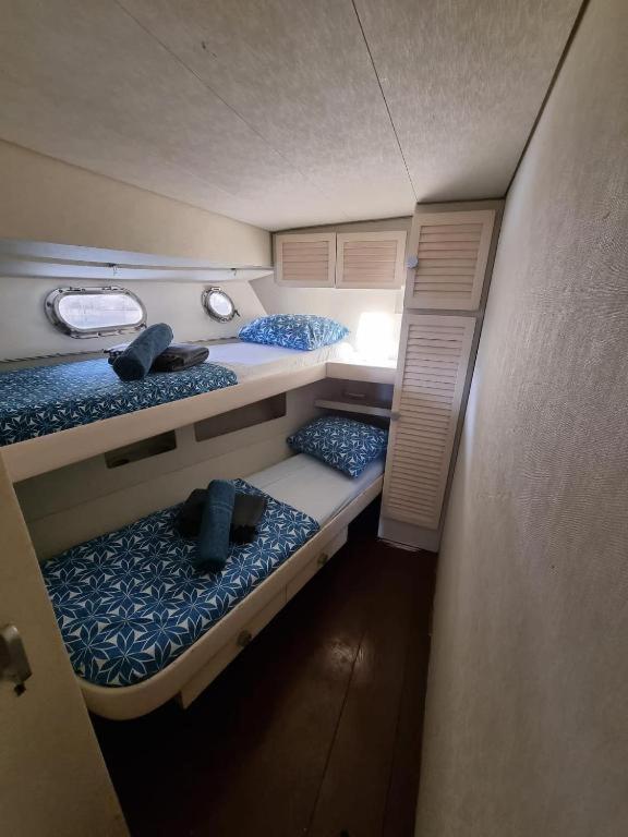 Postel nebo postele na pokoji v ubytování Yate en Gijon , experiencia única