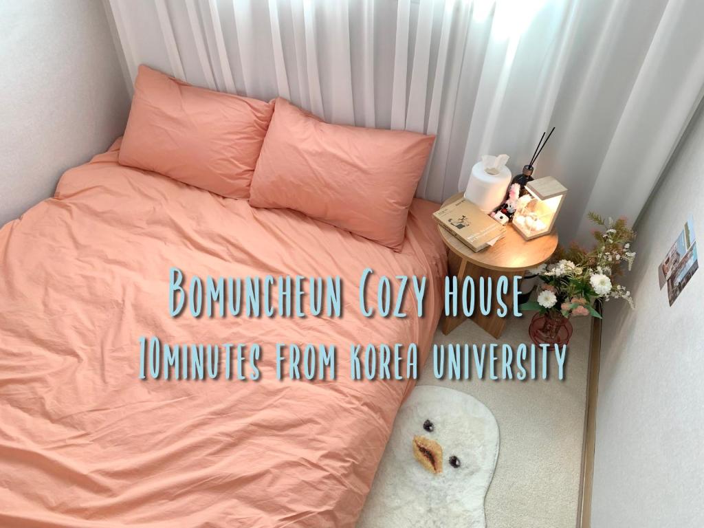 Postel nebo postele na pokoji v ubytování 10minutes from Korea University#cozy house#동대문