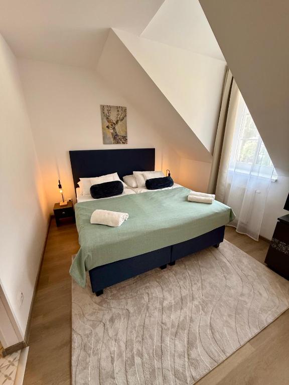 A bed or beds in a room at Penzión U Srnčíka