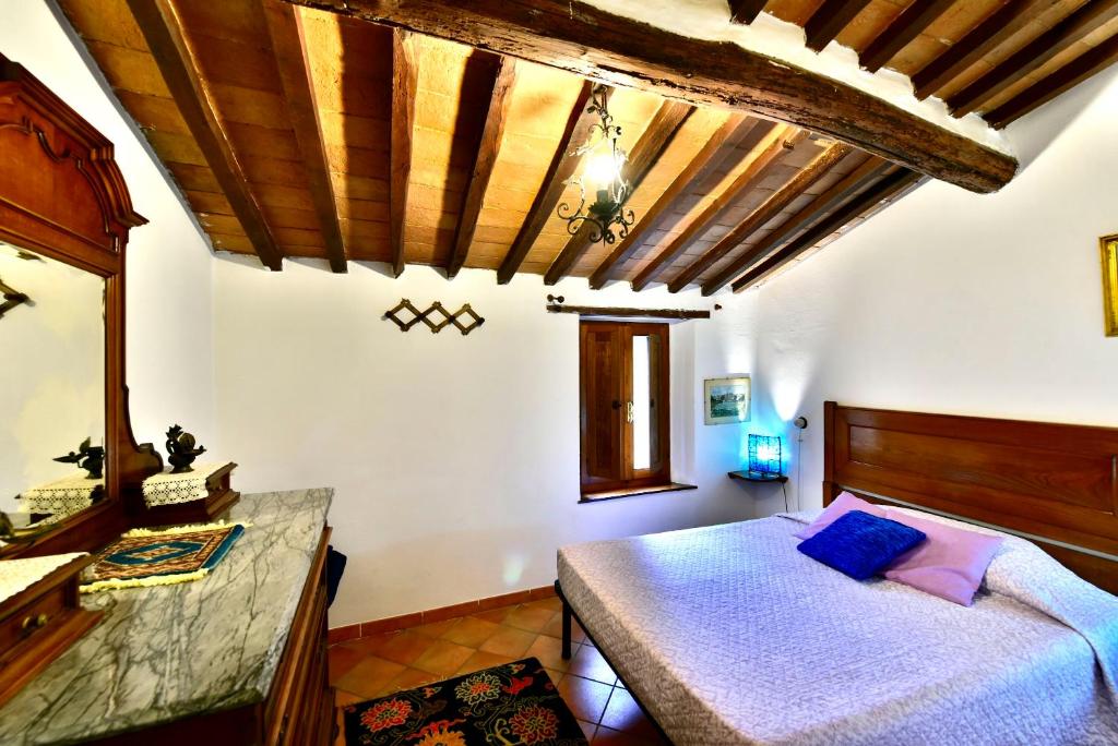 Postel nebo postele na pokoji v ubytování Agriturismo Corvaia