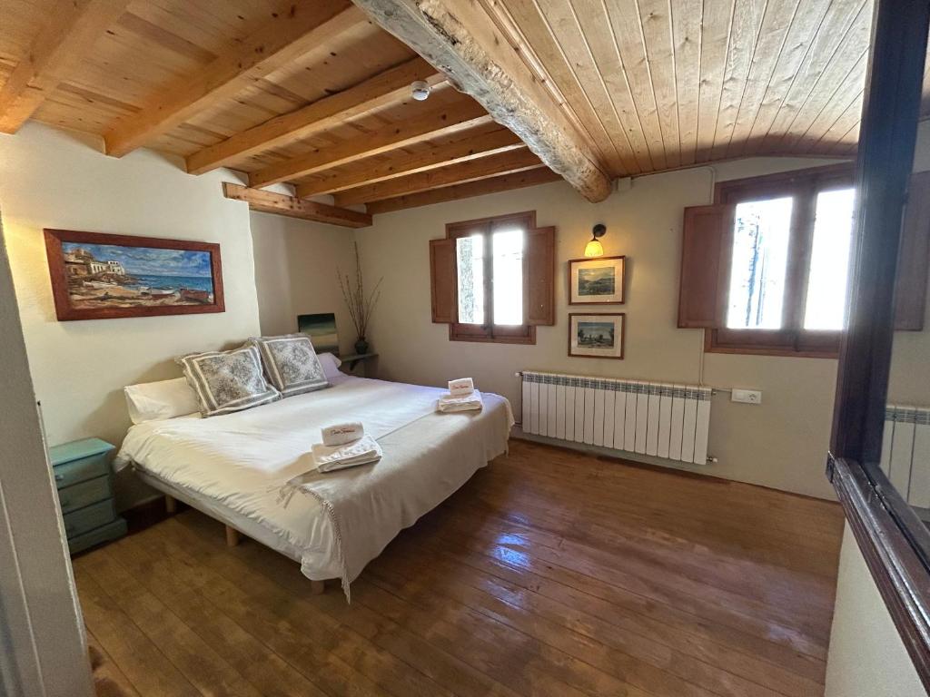 Postel nebo postele na pokoji v ubytování Casa Tapiolas Rectoría