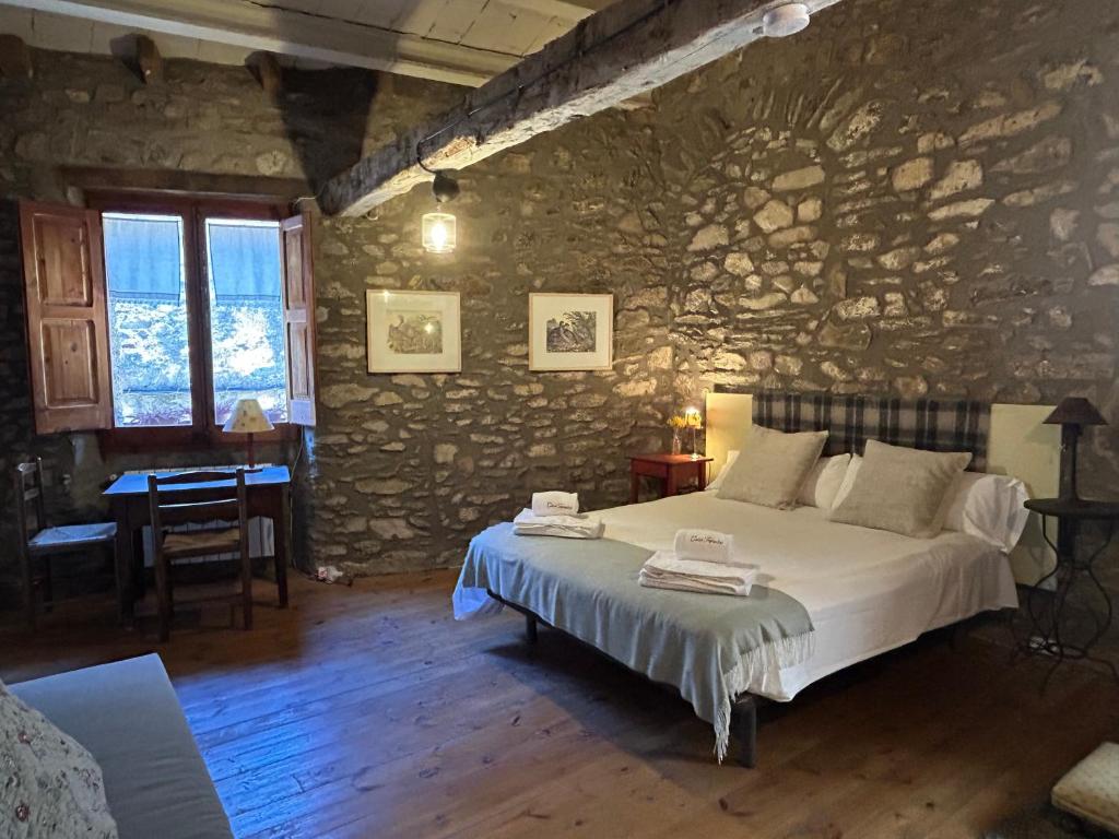 Postel nebo postele na pokoji v ubytování Casa Tapiolas Rectoría