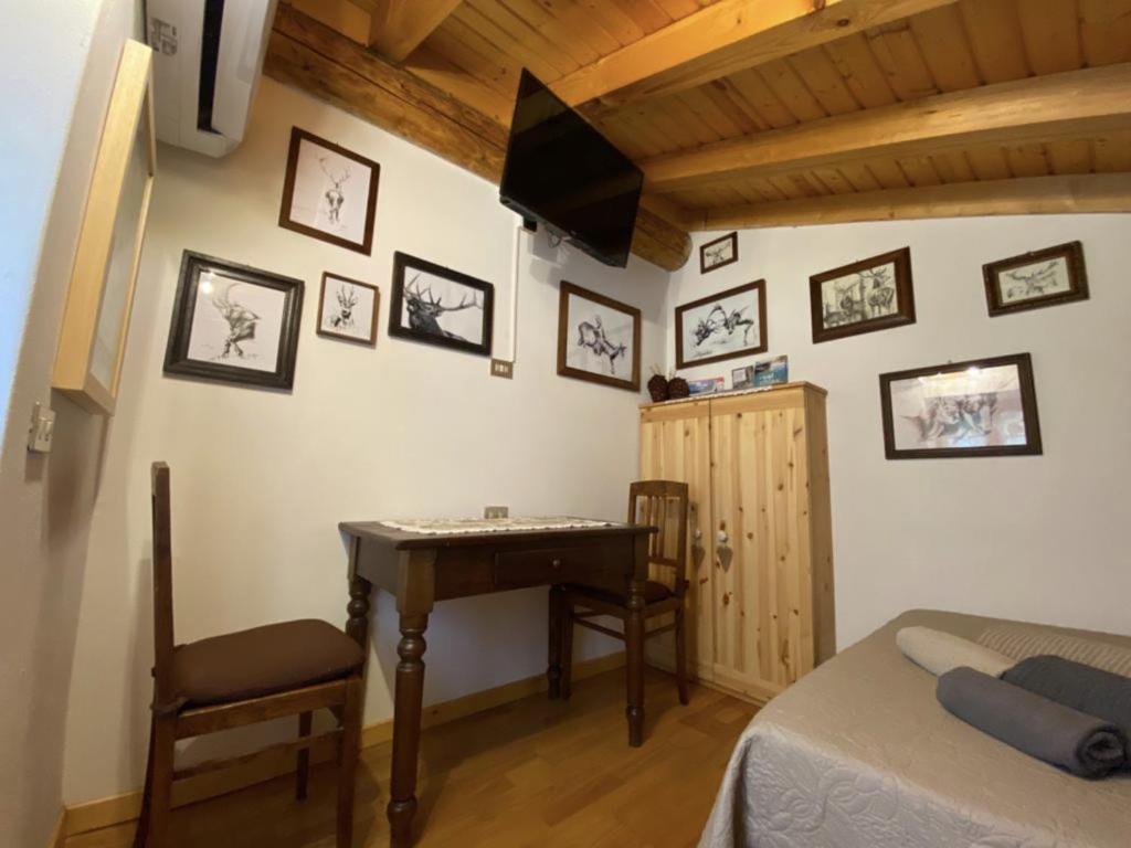 Televízia a/alebo spoločenská miestnosť v ubytovaní La Casa delle Castagne