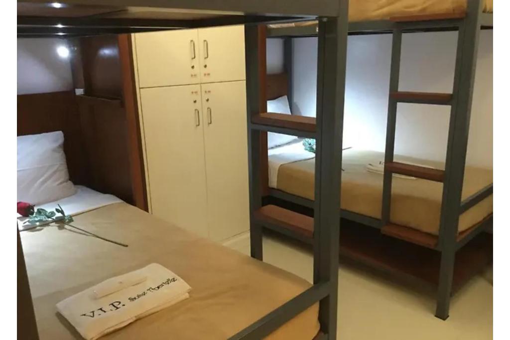 Postel nebo postele na pokoji v ubytování Townhouse OAK Makati Manila Near PNR Pasay Evangelista formerly VIP Suites