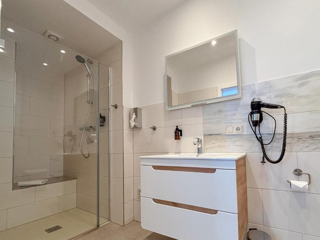 Koupelna v ubytování DORMERO Hotel Wilhelmshaven