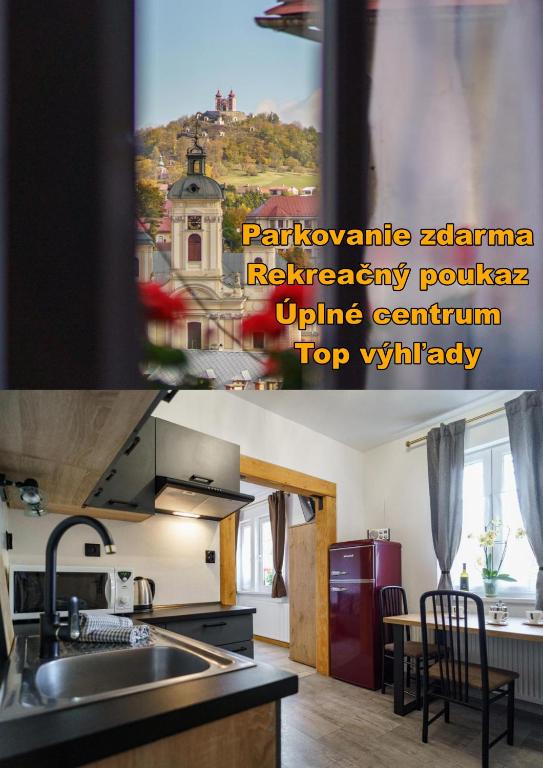 Kuchyňa alebo kuchynka v ubytovaní Ateliér Central