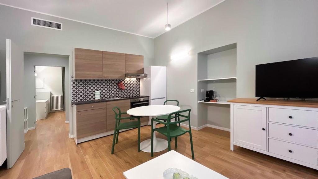 Kuchyň nebo kuchyňský kout v ubytování Appartamento Cavour - Affitti Brevi Italia