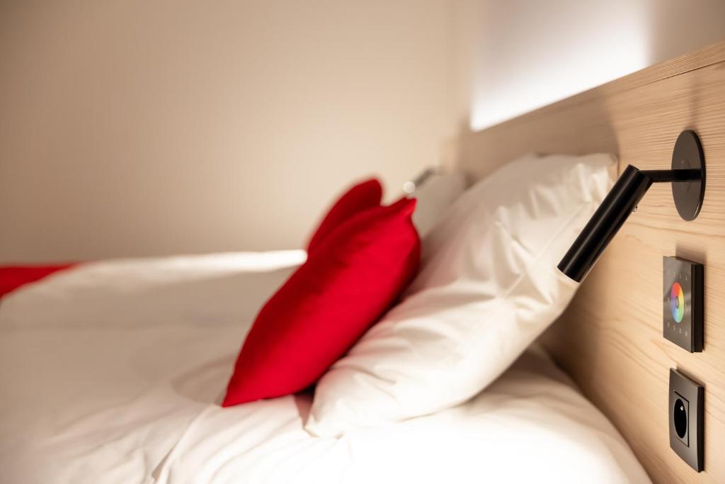 Postel nebo postele na pokoji v ubytování Bremberg Hotel