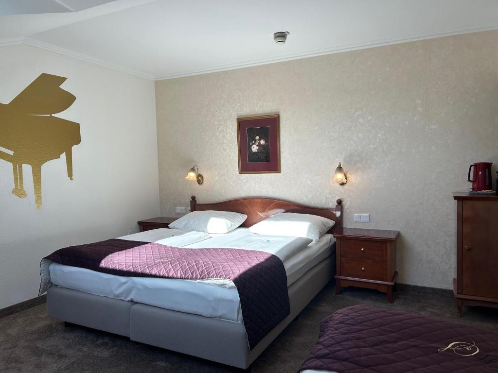Hotel Am Schubertring客房内的一张或多张床位
