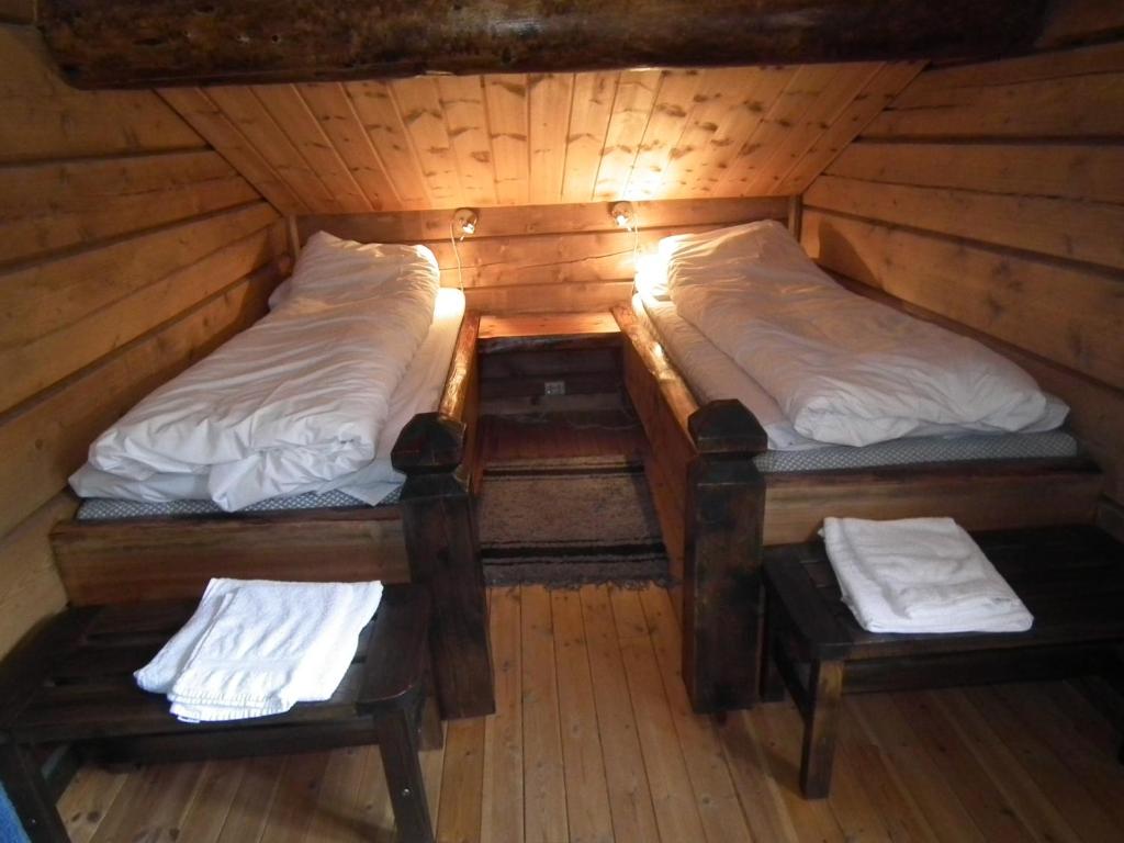 Postel nebo postele na pokoji v ubytování Namsentunet