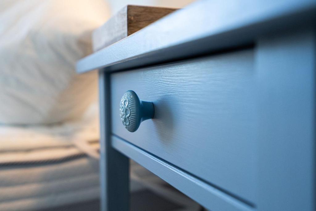 Postel nebo postele na pokoji v ubytování Solymar Whg 64