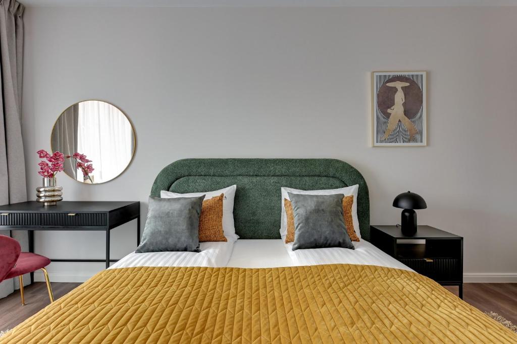 Posteľ alebo postele v izbe v ubytovaní Scala City Center Premium Apartments by Lion Apartments