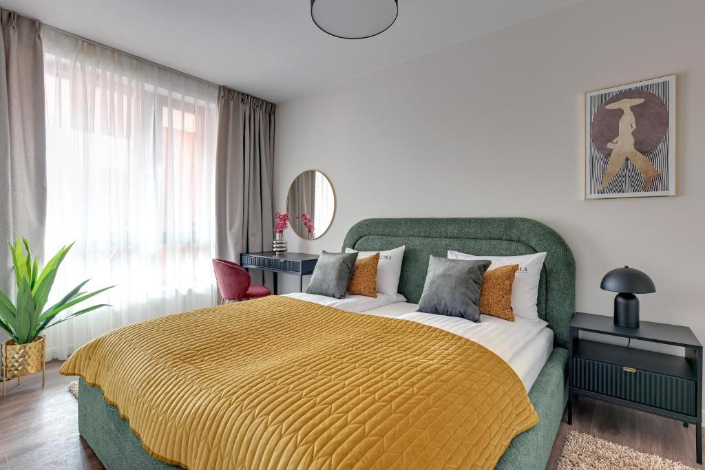 Posteľ alebo postele v izbe v ubytovaní Scala City Center Premium Apartments by Lion Apartments