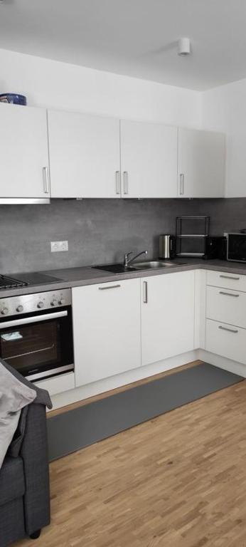 Kuchyň nebo kuchyňský kout v ubytování Hotel Domhof
